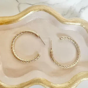 Argollas grandes engranaje dorados