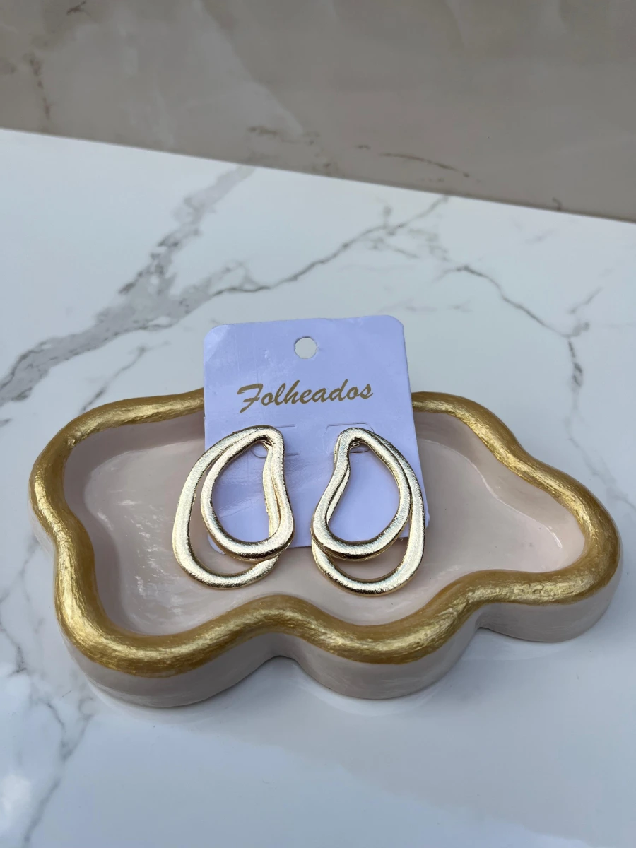 Argollas grandes tipo huesito dorado