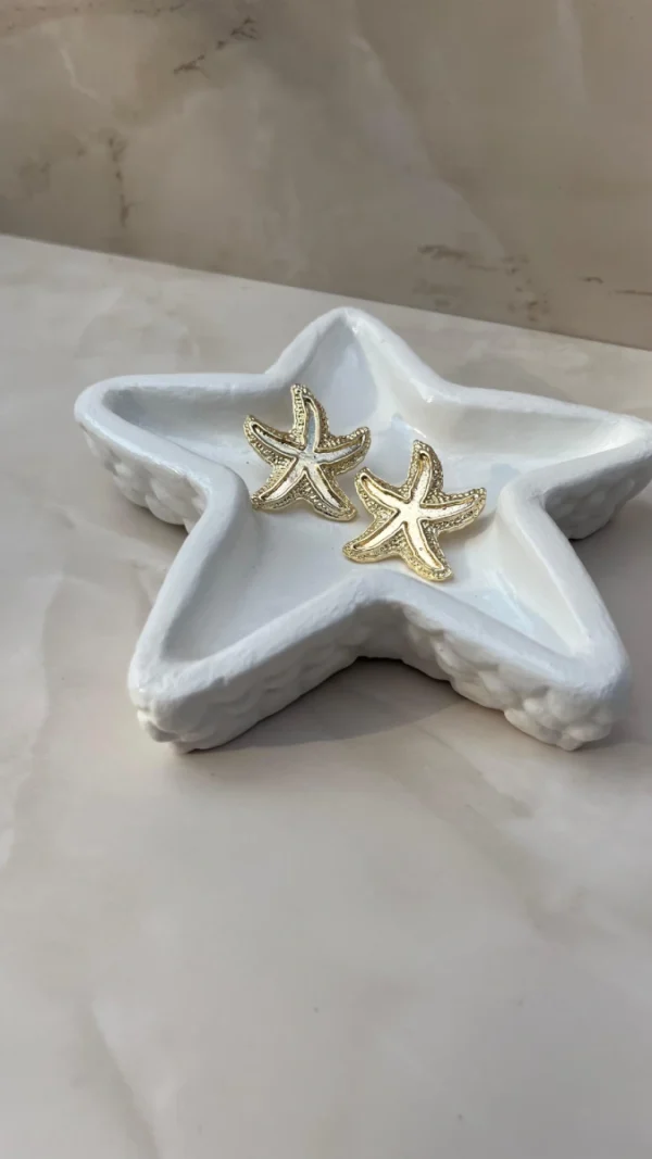 Estrella de mar puntas zig zag dorado