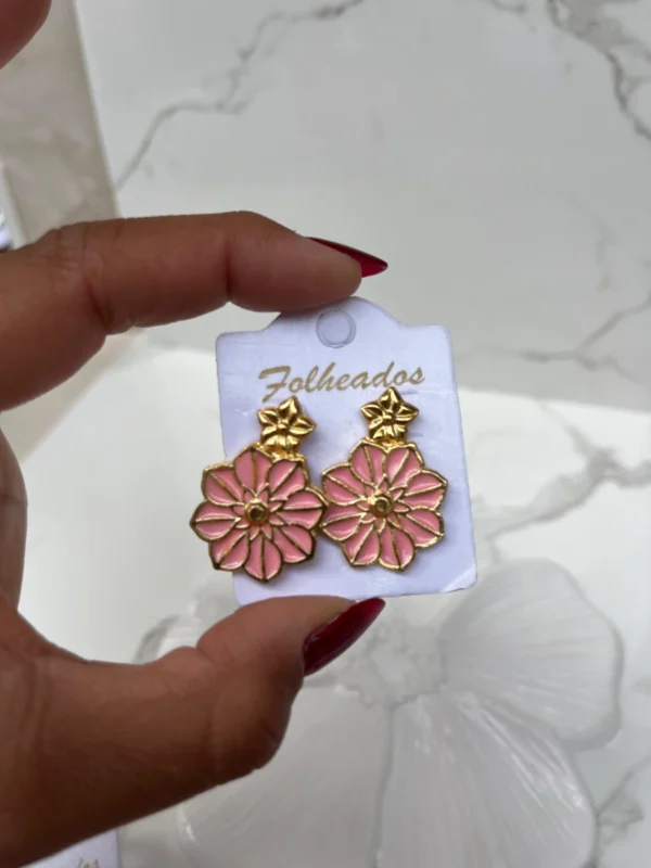 Flor 8 puntas rosa bebe con flor dorada pequeñas
