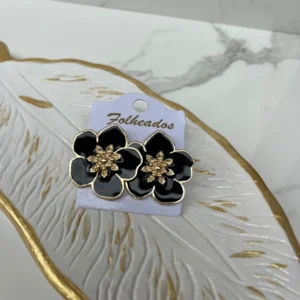 Flor grande negra con dorado