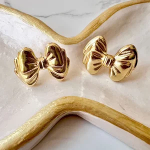 Moñitos tres pequeños dorados