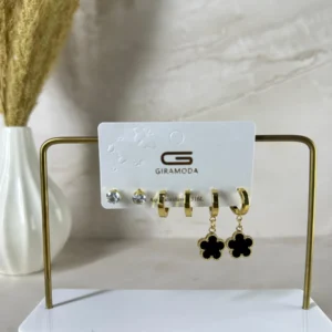Set dormilona y flor negra dorado