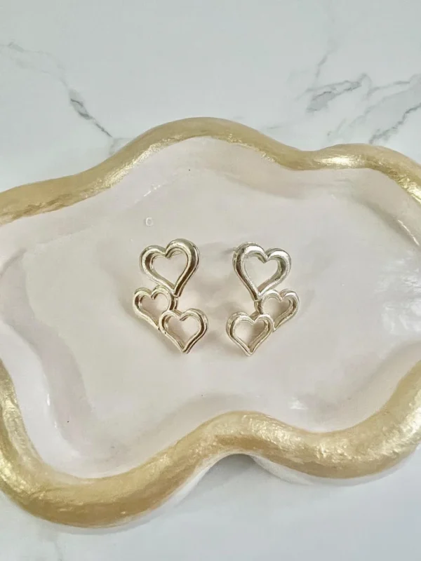 Trio corazón sin relleno dorado