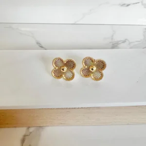 Van cleff dorados con detalles dorados