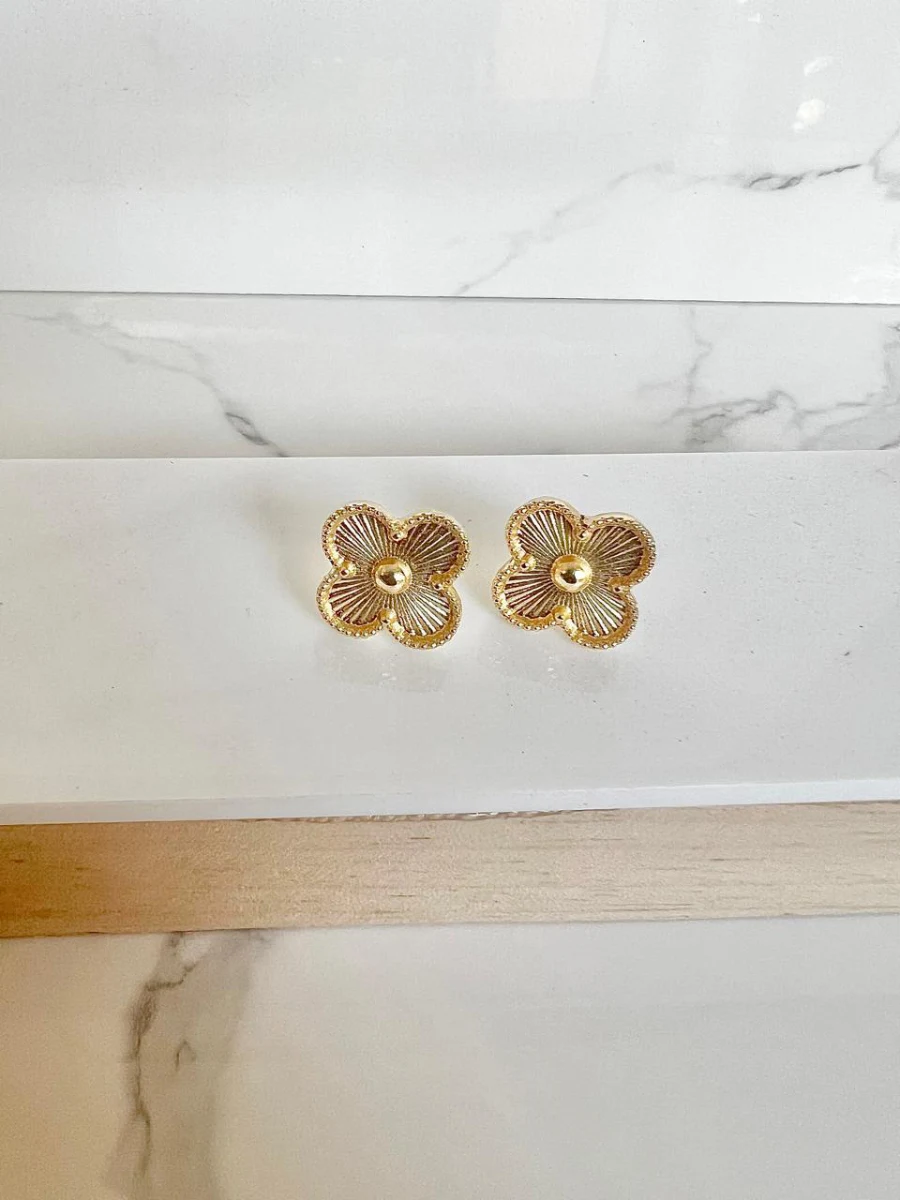 Van cleff dorados con detalles dorados