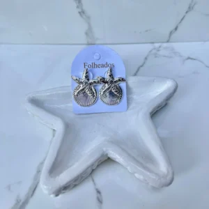 Estrella de mar con conchita plateada