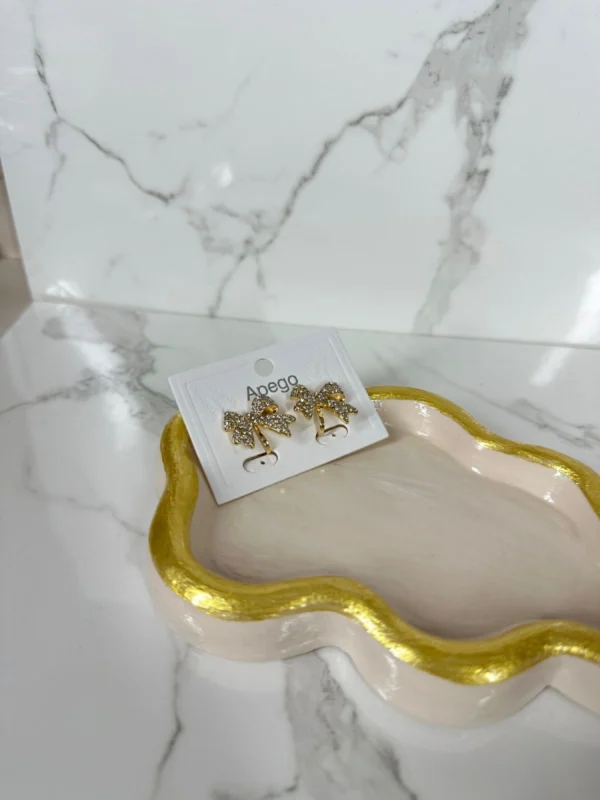 Moñitos a presión dorados