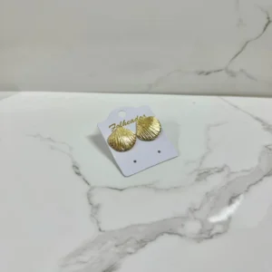 Conchita pequeñas doradas