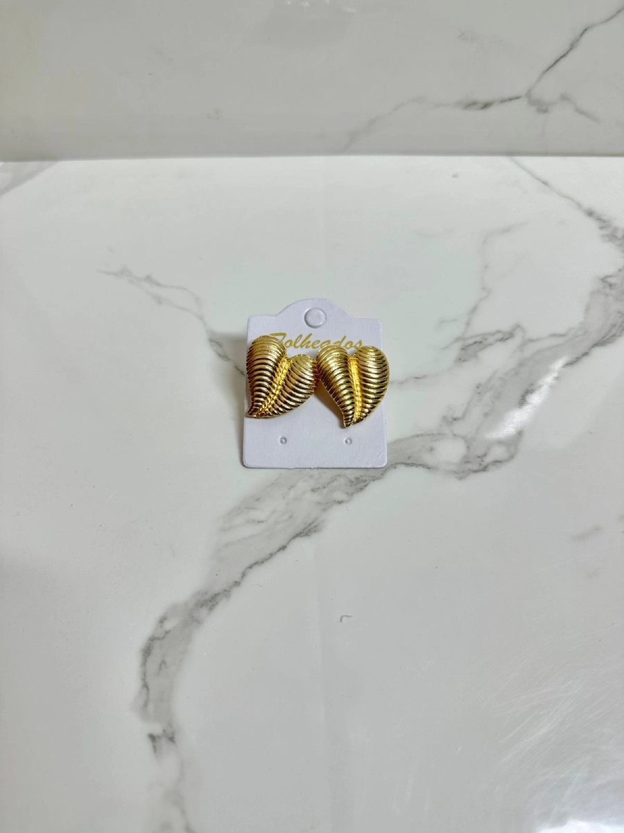 Corazón rayado dorado